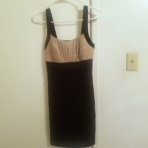 Black dress with gold sequin top